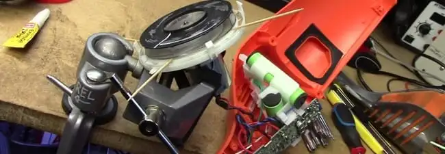 Vacuum cleaner repair parts and tools on a workbench in Chattanooga, TN